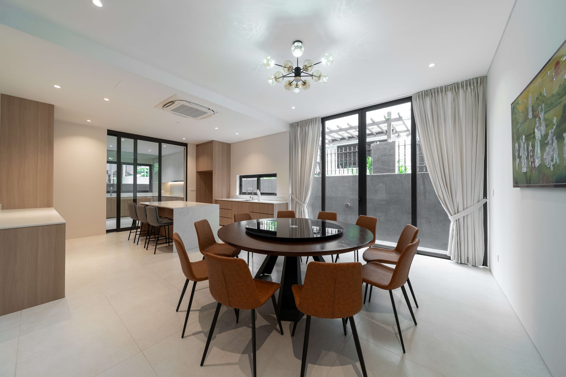 Large format porcelain and luxury vinyl floor installation in dining room