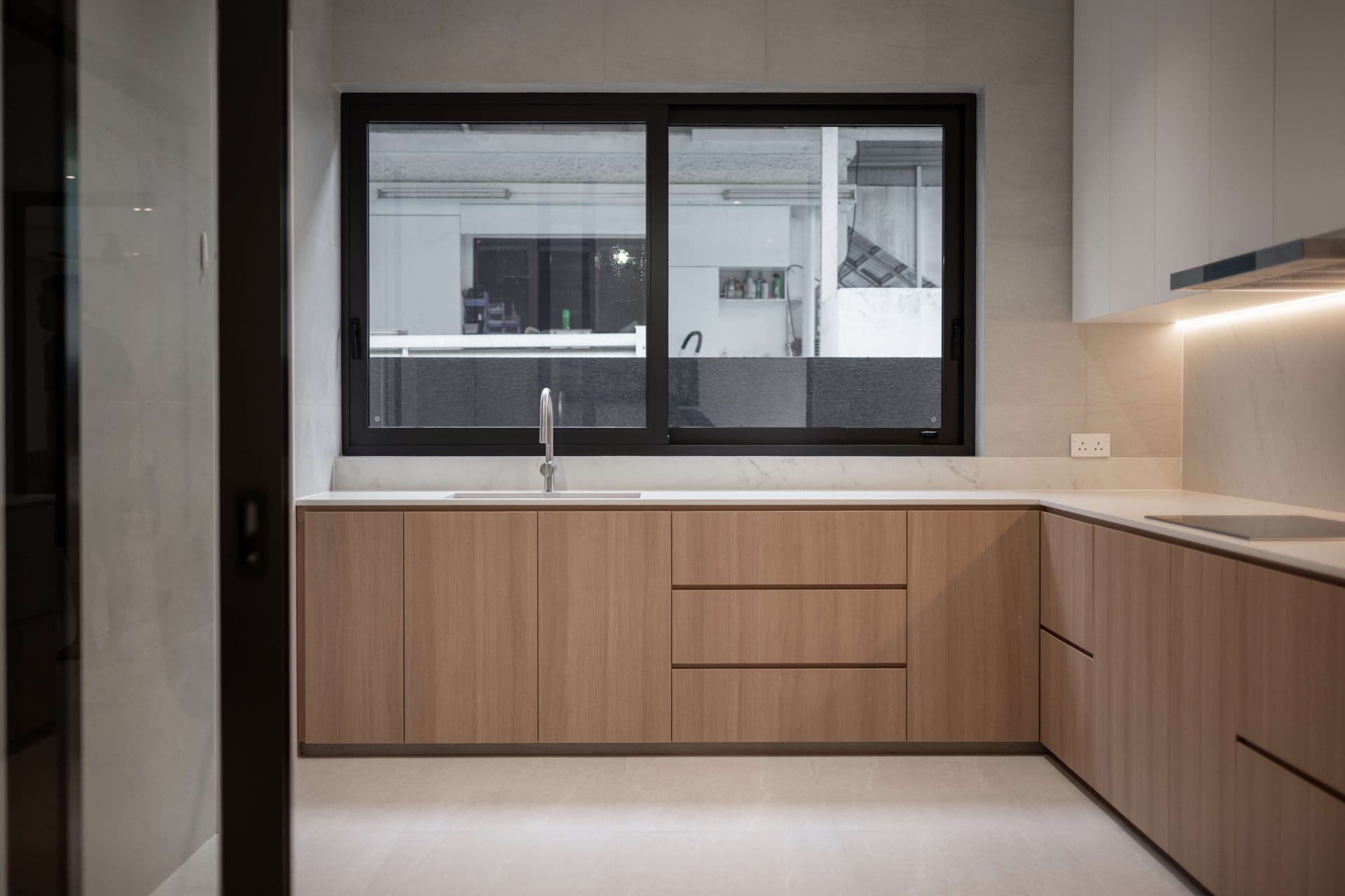Custom built kitchen joinery and quartz countertop in landed home